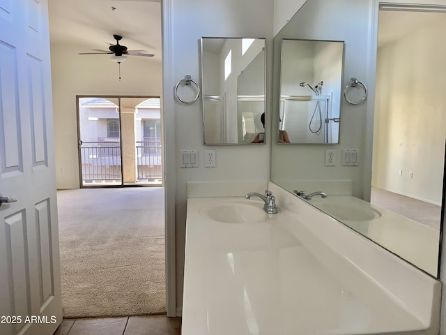 2402 E 5th St Unit 1472, Tempe, AZ 85288 - bathroom with a ceiling fan, vanity, and decorative columns