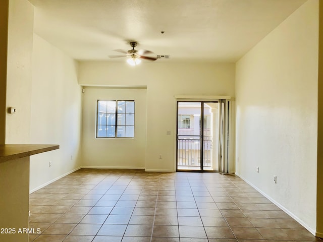 2402 E 5th St Unit 1472, Tempe, AZ 85288 - spare room with a ceiling fan and tile patterned floors