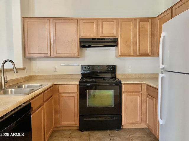 2402 E 5th St Unit 1472, Tempe, AZ 85288 - kitchen with black appliances, under cabinet range hood, light tile patterned floors, and light countertops