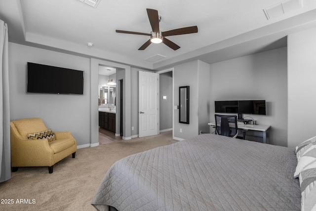 carpeted bedroom featuring ensuite bathroom and ceiling fan