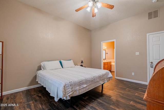 10691 E 37th Pl, Yuma, AZ 85365 - bedroom with visible vents, dark wood-style flooring, baseboards, and ensuite bathroom
