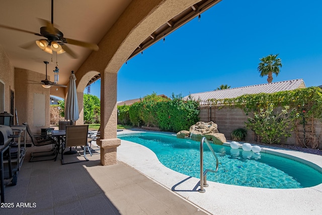 10691 E 37th Pl, Yuma, AZ 85365 - view of pool featuring a patio area, ceiling fan, a fenced backyard, outdoor dining space, and a fenced in pool