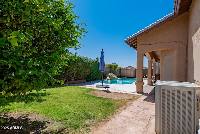 10691 E 37th Pl, Yuma, AZ 85365 - view of yard featuring a fenced in pool, a patio area, central AC, and a fenced backyard