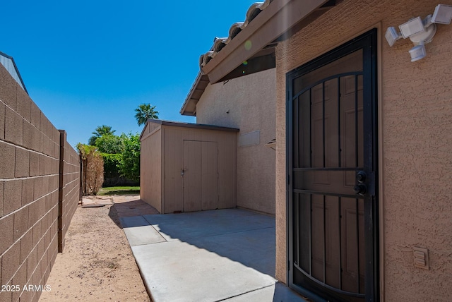 10691 E 37th Pl, Yuma, AZ 85365 - entrance to property with a patio, stucco siding, and fence
