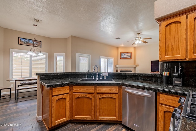 10691 E 37th Pl, Yuma, AZ 85365 - kitchen with a sink, tile countertops, dishwasher, and ceiling fan with notable chandelier
