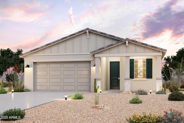 ranch-style home featuring a garage, board and batten siding, and driveway