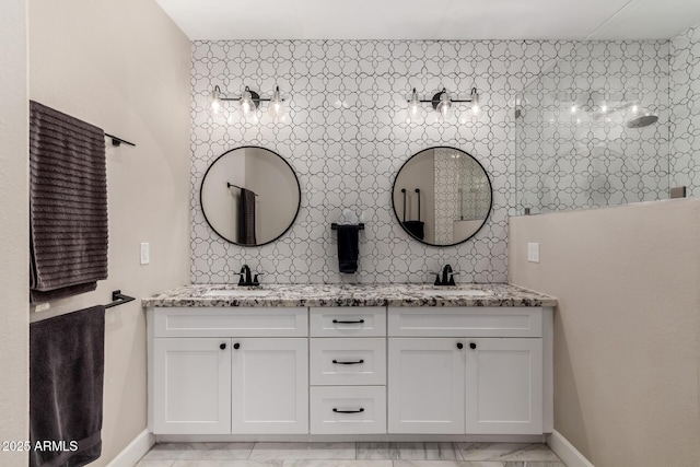 bathroom with tasteful backsplash, vanity, and a shower