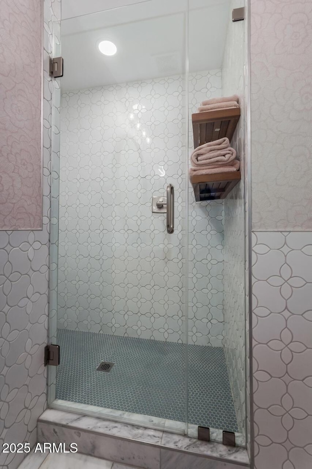 bathroom with an enclosed shower