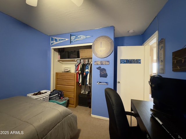 bedroom with carpet floors and a closet