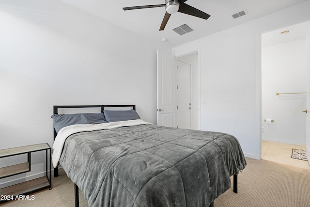 bedroom with light colored carpet and ceiling fan