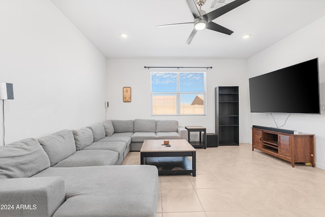 living room with light tile patterned floors and ceiling fan