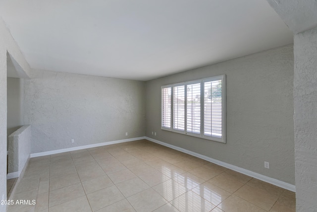 view of tiled spare room