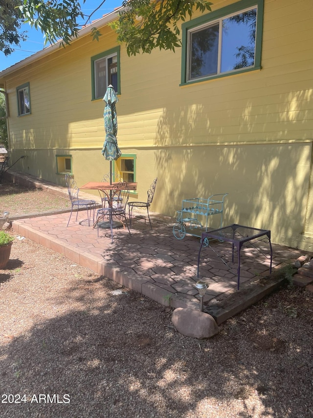 rear view of house featuring a patio area