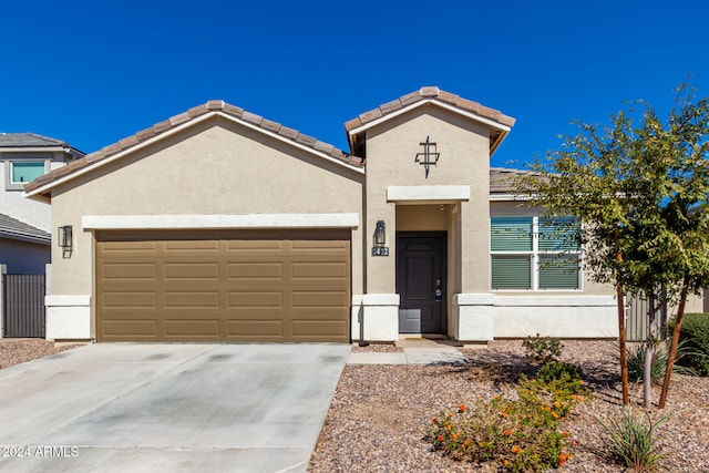 view of front of property with a garage