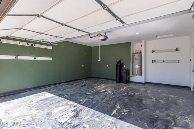 garage featuring a garage door opener and electric water heater