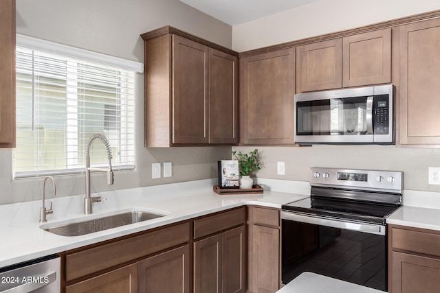 kitchen with stainless steel appliances and sink