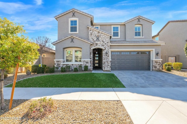 view of front facade featuring an attached garage, stone siding, decorative driveway, and stucco siding