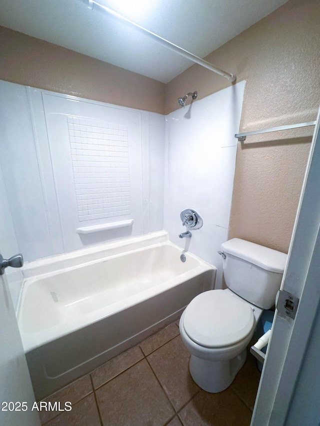 1075 E Chandler Blvd Unit 220, Chandler, AZ 85225 - full bathroom with toilet, bathtub / shower combination, a textured wall, and tile patterned flooring