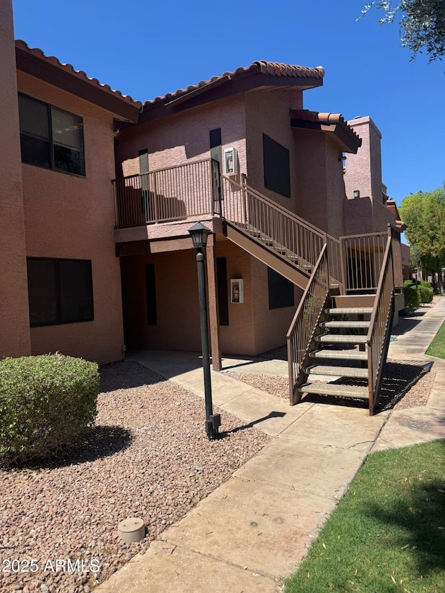 1075 E Chandler Blvd Unit 220, Chandler, AZ 85225 - view of property featuring stairway