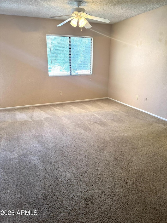 1075 E Chandler Blvd Unit 220, Chandler, AZ 85225 - carpeted spare room featuring ceiling fan, a textured ceiling, and baseboards