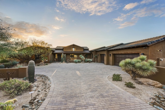 view of front of house with a garage