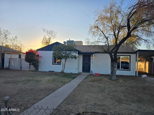6216 S 5th Ave, Phoenix, AZ 85041 - view of front of house with stucco siding and roof with shingles
