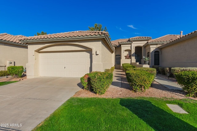 mediterranean / spanish-style home featuring a garage