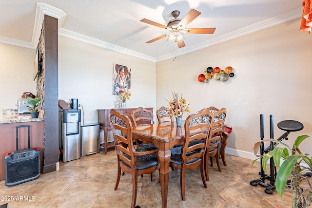 dining area with crown molding and ceiling fan