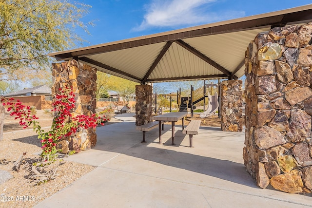 surrounding community featuring a gazebo and a patio area