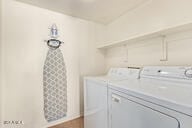 laundry area with washer and dryer