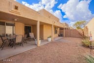 rear view of property featuring a patio