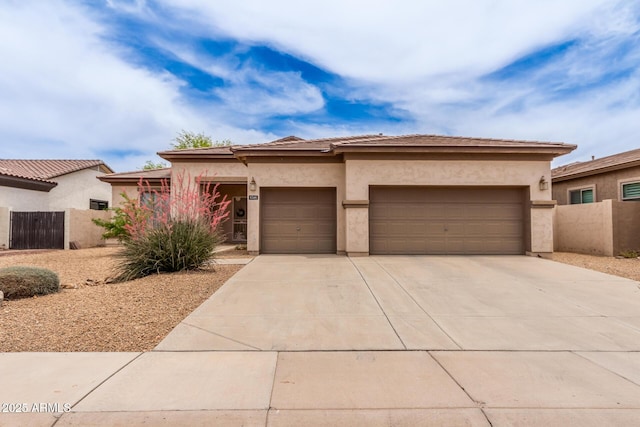 5749 S Dragoon Dr, Chandler, AZ 85249 - prairie-style home featuring an attached garage, concrete driveway, and stucco siding