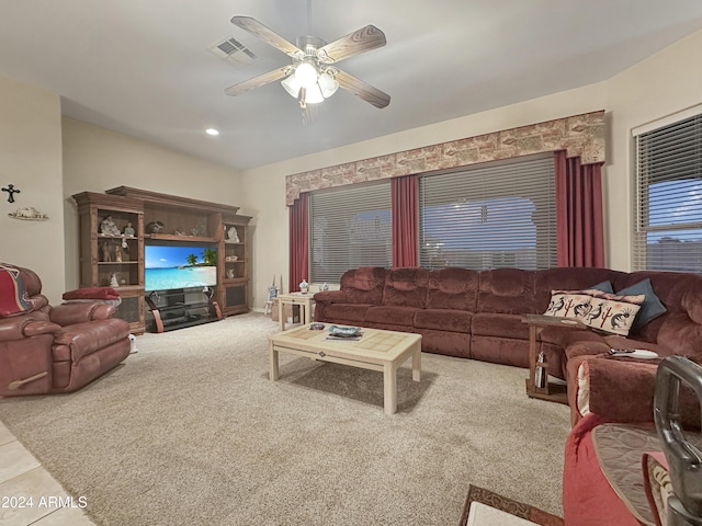 living room featuring ceiling fan and light colored carpet