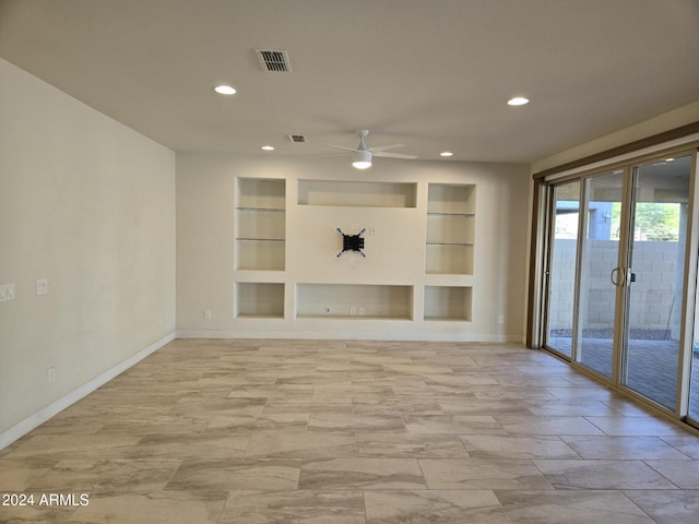 unfurnished living room with built in features and ceiling fan