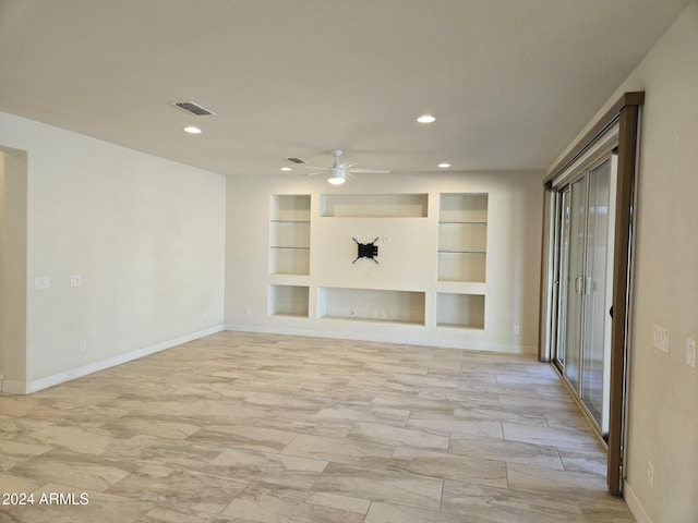 unfurnished living room featuring built in features and ceiling fan