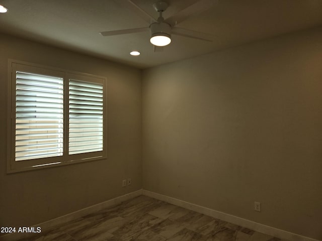 empty room featuring ceiling fan