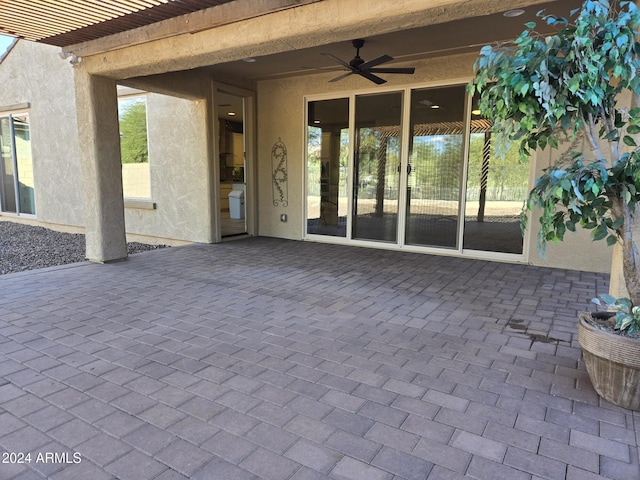 view of patio / terrace featuring ceiling fan