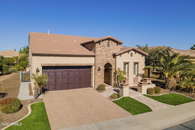 view of front of property with a garage