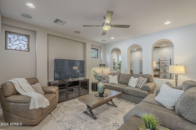 living room featuring ceiling fan