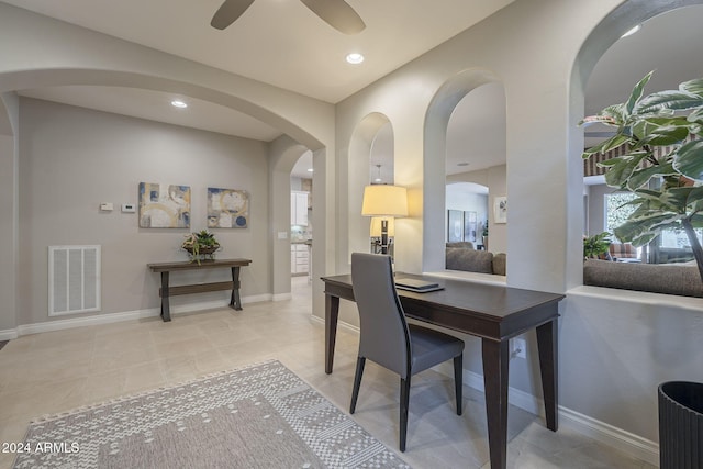 dining space with ceiling fan