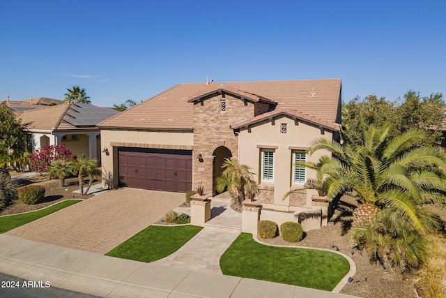 view of front of home featuring a garage