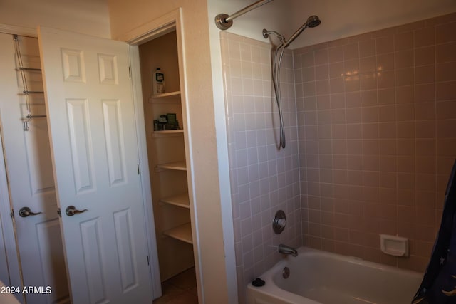 bathroom with shower / tub combo with curtain