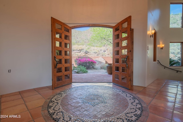 foyer entrance featuring tile floors