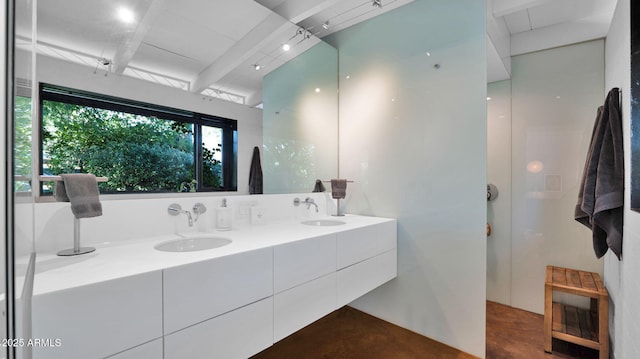 5714 N 11th St, Phoenix, AZ 85014 - bathroom featuring double vanity, concrete flooring, and beam ceiling