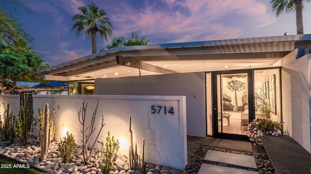 5714 N 11th St, Phoenix, AZ 85014 - doorway to property featuring concrete block siding