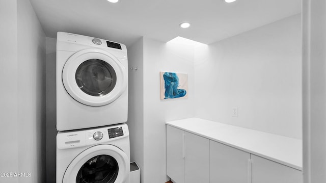 5714 N 11th St, Phoenix, AZ 85014 - laundry room featuring estacked washer and dryer, recessed lighting, and cabinet space