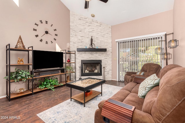 living room featuring a fireplace, dark hardwood / wood-style flooring, ceiling fan, and high vaulted ceiling