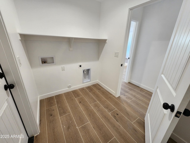 washroom featuring gas dryer hookup, electric dryer hookup, hookup for a washing machine, and hardwood / wood-style flooring