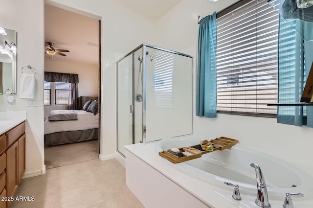 bathroom with vanity, separate shower and tub, tile patterned floors, and ceiling fan