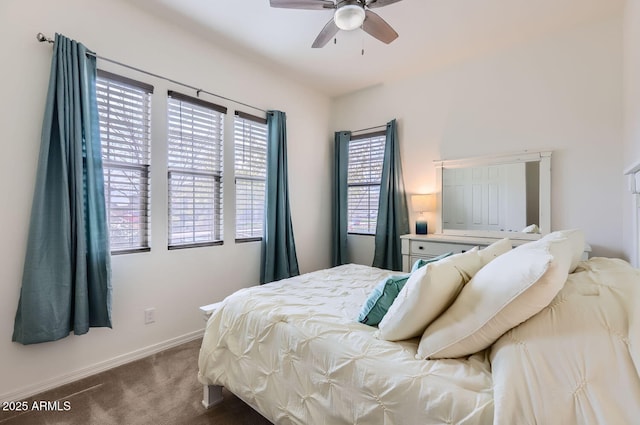 bedroom with ceiling fan and carpet floors